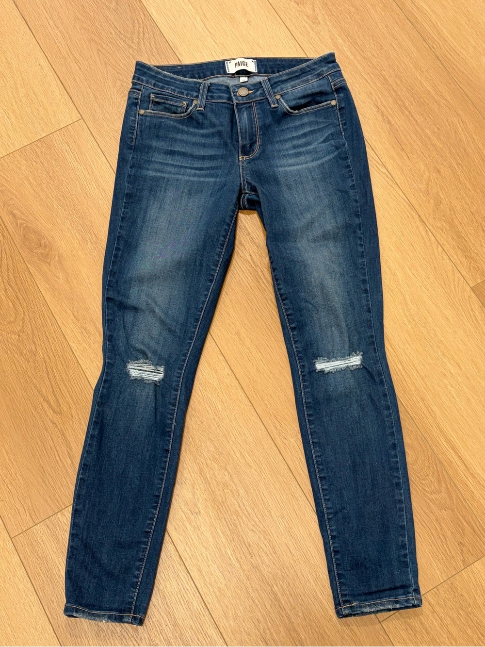PAIGE Skinny Jeans in Dark Blue with Knee Rips